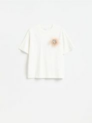T-shirt z odpinaną broszką - biały. Białe t-shirty damskie Reserved, l, bez wzorów, z bawełny, bez kołnierzyka. Za 89.99 zł.