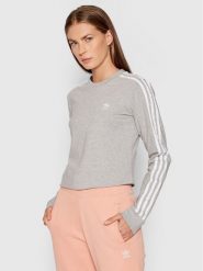 Adidas Bluzka adicolor Classics H33570 Szary Standard Fit. Szare bluzki damskie Adidas, bez wzorów, z bawełny, bez kołnierzyka, bez ramiączek. Za 119.99 zł.