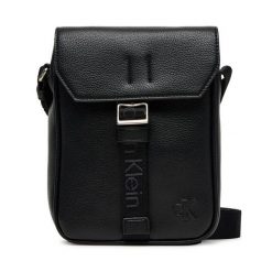 Saszetka Calvin Klein. Czarne saszetki męskie Calvin Klein, młodzieżowe, małe. Za 249.99 zł.