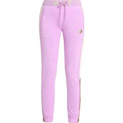 Fenty PUMA by Rihanna FITTED TRACK PANT Spodnie treningowe violet. Spodnie dresowe damskie Fenty PUMA by Rihanna, z bawełny. Za 719.00 zł.