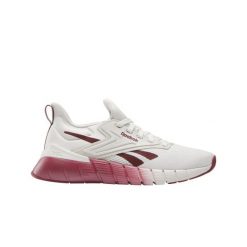 Buty treningowe damskie Reebok Nano Gym. Czerwone obuwie sportowe damskie Reebok, bez wzorów, z materiału, na fitness i siłownię. Za 389.99 zł.