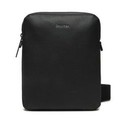 Saszetka Calvin Klein. Czarne saszetki męskie Calvin Klein, młodzieżowe, małe. Za 279.99 zł.