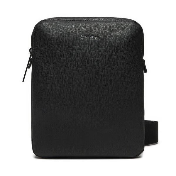 Saszetka Calvin Klein. Czarne saszetki męskie Calvin Klein, młodzieżowe, małe. Za 279.99 zł.