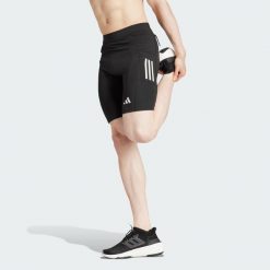 Legginsy Own the Run Short. Fioletowe legginsy damskie Adidas, xs, bez wzorów, z materiału, krótkie, do biegania. Za 219.00 zł.