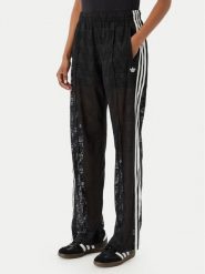 Adidas Spodnie dzianinowe Crochet Firebird KD0346 Czarny Regular Fit. Czarne spodnie materiałowe damskie Adidas, xs, bez wzorów, z dzianiny. Za 359.99 zł.