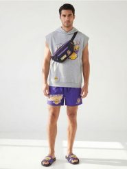 Saszetka NBA - czarny. Czarne saszetki męskie Sinsay, małe. Za 29.99 zł.