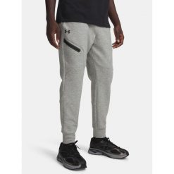 Spodnie męskie Under Armour Unstoppable Fleece. Szare buty sportowe męskie Under Armour, m, bez wzorów, na fitness i siłownię. Za 369.99 zł.