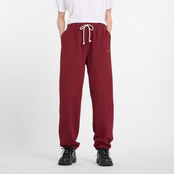 Spodnie damskie New Balance WP41513MHB – bordowe. Czerwone spodnie sportowe damskie New Balance, m, bez wzorów, z bawełny. Za 379.99 zł.