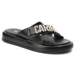Czarne Klapki Carinii Modne Buty Damskie. Czarne klapki damskie Carinii, bez wzorów, z materiału, bez obcasa. Za 399.00 zł.