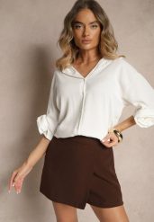 Biała Koszula Ozdobiona Kwiatami 3DTenisela. Białe bluzki damskie Renee, bez wzorów, z jeansu, klasyczne, bez kołnierzyka, bez ramiączek. Za 54.99 zł.