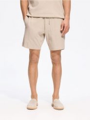 Dresowe szorty regular fit - beżowy. Brązowe szorty męskie Reserved, l, bez wzorów, z bawełny. Za 89.99 zł.