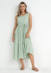 Miętowa Wiskozowa Sukienka Midi z Gumką w Pasie i Materiałowym Paskiem Bicuh. Zielone sukienki damskie Born2be, na lato, l, bez wzorów, z materiału, bez kołnierzyka, bez ramiączek, midi, rozkloszowane. Za 79.99 zł.