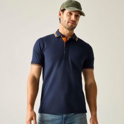 Męska koszulka polo Adryan Tipped. Niebieskie koszulki polo męskie Regatta, l, bez wzorów, z bawełny, eleganckie, bez ramiączek. Za 99.99 zł.