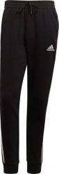 Adidas Spodnie męskie adidas Essentials Fleece czarne GK8821 S. Czarne spodnie sportowe męskie Adidas, m, bez wzorów. Za 182.12 zł.