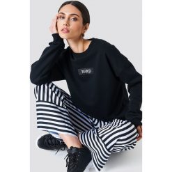 NA-KD Bluza oversize z nadrukiem - Black. Czarne bluzy damskie NA-KD, z nadrukiem, z dzianiny. Za 161.95 zł.