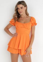 Pomarańczowy Kombinezon Rhodosyne. Brązowe sukienki damskie Born2be, na imprezę, m, bez wzorów, eleganckie, bez kołnierzyka, bez ramiączek, mini. Za 129.99 zł.