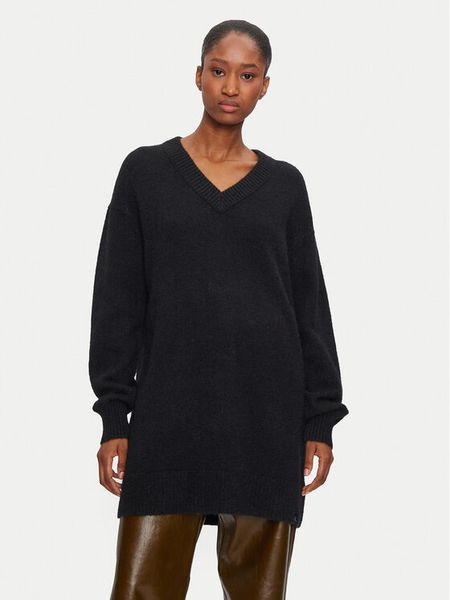 Calvin Klein Jeans Sukienka dzianinowa J20J224638 Czarny Loose Fit. Czarne sukienki damskie Calvin Klein Jeans, s, bez wzorów, z dzianiny, bez kołnierzyka, bez ramiączek. Za 349.99 zł.