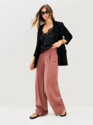 Spodnie wide leg z lyocellem i domieszką lnu - żółty. Żółte spodnie materiałowe damskie Sinsay, l, bez wzorów, z lyocellu. Za 59.99 zł.
