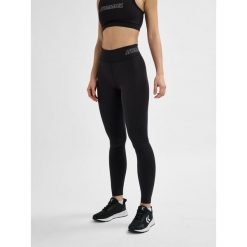 Damskie legginsy Hummel. Białe legginsy damskie Hummel, bez wzorów, z dżerseju, na fitness i siłownię. Za 174.50 zł.