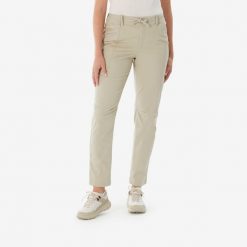 Spodnie turystyczne damskie Quechua NH500 Regular. Brązowe spodnie sportowe damskie QUECHUA, l, bez wzorów, z elastanu, trekkingowe. Za 119.99 zł.