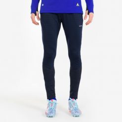 Spodnie piłkarskie Kipsta CLR. Niebieskie spodnie sportowe męskie KIPSTA, l, bez wzorów, z materiału, do piłki nożnej. Za 89.99 zł.