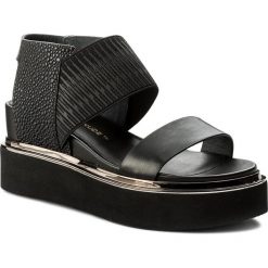 Sandały UNITED NUDE - Rico Sandal 103040188108 Black. Czarne klapki damskie United Nude, bez wzorów, z materiału, bez obcasa, na obcasie, bez zapięcia. W wyprzedaży za 549.00 zł.