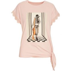 Jasnoróżowy T-shirt Hear Me. Bluzki damskie Born2be. Za 44.99 zł.