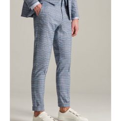 Spodnie garniturowe w kratę - Turkusowy. Eleganckie spodnie męskie marki Reserved. Za 169.99 zł.