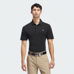 Koszulka polo Ultimate365 Solid. Czarne buty sportowe męskie Adidas, m, bez wzorów, z materiału, sportowe, bez ramiączek. W wyprzedaży za 228.00 zł.