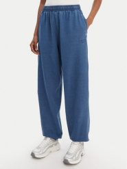 Reebok Spodnie dresowe Tenley RK25488CCW Niebieski Regular Fit. Niebieskie spodnie dresowe damskie Reebok, l, bez wzorów, z bawełny. Za 299.99 zł.