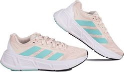 Adidas Buty damskie do biegania adidas Questar różowo-błękitne IF2243 42. Czerwone obuwie sportowe damskie Adidas, bez wzorów, do biegania. Za 337.64 zł.