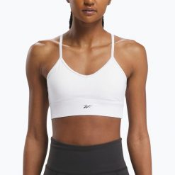 Biustonosz Reebok Workout Ready Sports. Białe obuwie sportowe damskie REEBOK FITNESS, bez wzorów, na fitness i siłownię, Reebok Workout. Za 109.99 zł.