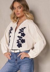 Różowa Bluzka z Wiskozy Ozdobiona Falbankami i Wiązaniem Fonoriel. Czerwone bluzki damskie Renee, na wiosnę, l, bez wzorów, z jeansu, eleganckie, bez kołnierzyka, bez ramiączek. Za 79.99 zł.