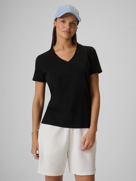 T-shirt regular gładki damski 4F 4FRMM00TTSHF3618. Czarne t-shirty damskie 4f, uniwersalny, bez wzorów, z bawełny, biznesowe, bez kołnierzyka. Za 49.99 zł.
