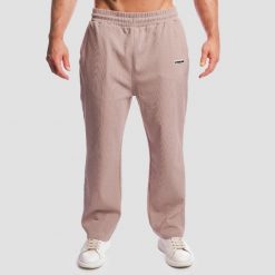 Spodnie męskie fitness oversize Aura. Brązowe spodnie sportowe męskie GYMBEAM, m, bez wzorów, z bawełny, na fitness i siłownię. Za 139.90 zł.