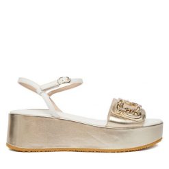 Sandały Liu Jo. Żółte sandały damskie Liu Jo, bez wzorów, bez obcasa, na koturnie, bez zapięcia. Za 599.99 zł.