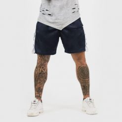 Spodenki GymBeam Vertical. Niebieskie krótkie spodenki sportowe męskie GYMBEAM, l, bez wzorów, z materiału, na fitness i siłownię. Za 39.99 zł.