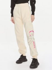 Calvin Klein Jeans Spodnie dresowe Bold Monologo J20J222606 Żółty Relaxed Fit. Żółte jeansy damskie Calvin Klein Jeans, l, bez wzorów, z dresówki. Za 329.99 zł.