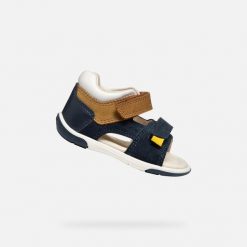 Sandały GEOX B SANDAL ZAPITO BOY Niebieski. Brązowe sandały męskie Geox, ze skóry, bez zapięcia. Za 264.00 zł.