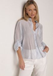 Niebieska Transparentna Koszula Ozdobiona Cyrkoniami Clymadia. Niebieskie bluzki damskie Born2be, l, bez wzorów, z jeansu, klasyczne, bez kołnierzyka, bez ramiączek. Za 79.99 zł.