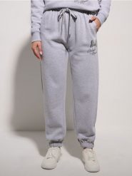 Spodnie jogger Minnie Mouse - szary. Szare spodnie materiałowe damskie Sinsay, l, bez wzorów. Za 39.99 zł.