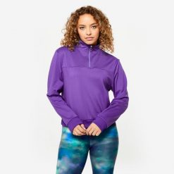 Bluza damska Domyos fitness. Fioletowe bluzy sportowe damskie DOMYOS, l, bez wzorów, z elastanu, bez kaptura, na fitness i siłownię. W wyprzedaży za 44.99 zł.