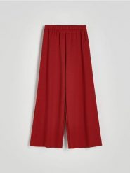 Spodnie wide leg - bordowy. Czerwone spodnie materiałowe damskie Reserved, l, bez wzorów, z dzianiny. W wyprzedaży za 69.99 zł.