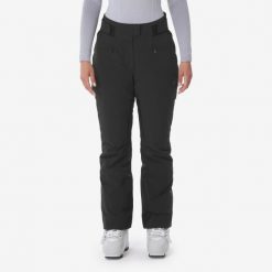 Spodnie narciarskie damskie Quechua SKP 900. Czarne spodnie materiałowe damskie QUECHUA, na zimę, l, bez wzorów, z materiału, narciarskie. Za 549.99 zł.