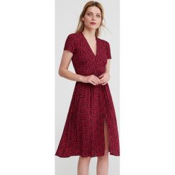 Sukienka w drobne kwiaty - Wielobarwn. Sukienki damskie marki Reserved. Za 179.99 zł.