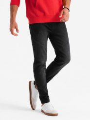Męskie jeansowe joggery z asymetrycznymi przeszyciami – czarne V3 OM-PADJ-0165 - XXL. Czarne spodnie materiałowe męskie Ombre Clothing, l, z aplikacjami, z bawełny, casualowe. Za 113.99 zł.