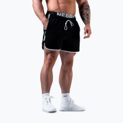 Spodenki treningowe męskie NEBBIA Hero. Czarne krótkie spodenki sportowe męskie Nebbia, m, bez wzorów, z bawełny, na fitness i siłownię. Za 229.99 zł.