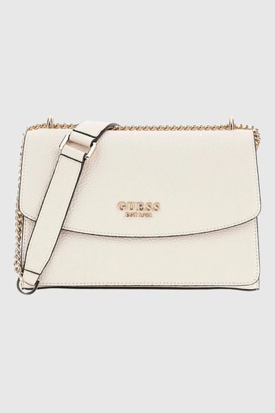 GUESS Beżowa kopertówka damska Calista. Brązowe kopertówki damskie Guess, z aplikacjami, ze skóry ekologicznej, duże, bez dodatków. W wyprzedaży za 272.99 zł.