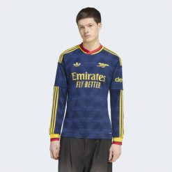 Koszulka wyjazdowa z długim rękawem Arsenal FC 26/27. Niebieskie koszulki sportowe męskie Adidas, l, bez wzorów, z dzianiny, bez kołnierzyka, bez ramiączek, do piłki nożnej, climacool (adidas). Za 479.00 zł.