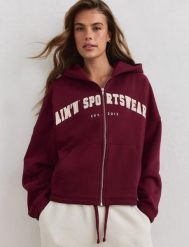 Damska bluza zapinana na zamek z kapturem Varsity bordowa. Czerwone bluzy damskie Aim'n, l, bez wzorów, z bawełny, z kapturem, na fitness i siłownię. Za 388.00 zł.
